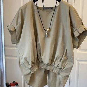 بلوزات zanzea للسيدات بحاشية عصرية لصيف 2025 برقبة دائرية وأكمام قصيرة بلوزات غير رسمية أنيقة بفتحة خلفية قميص علوي متين